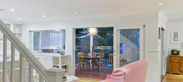 A lightened room with furniture