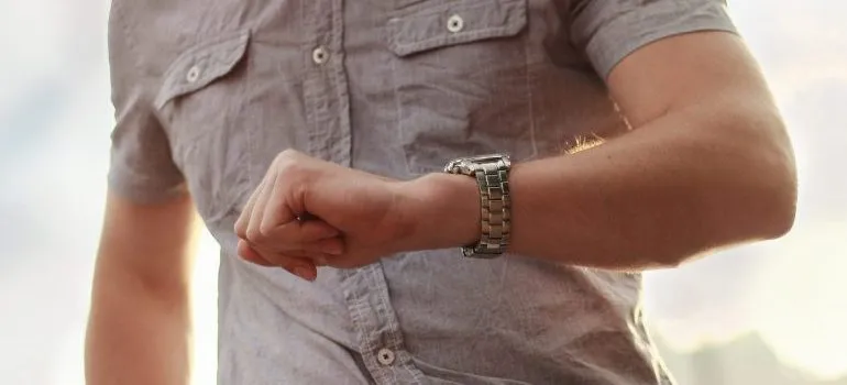 male looking at watch