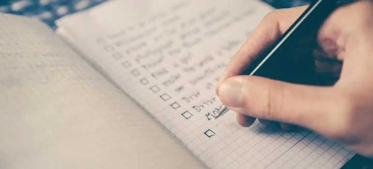 a person trying to create an international moving checklist