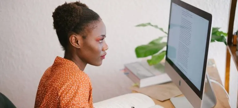 Woman looking for scores of the best schools in Brooklyn