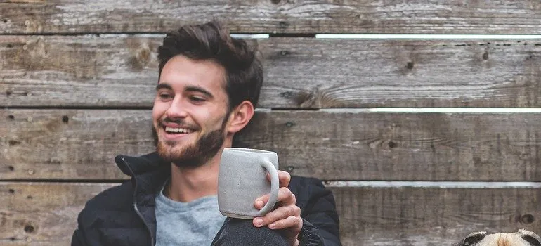 a man drinking coffee