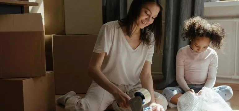 Mom and daughter packing