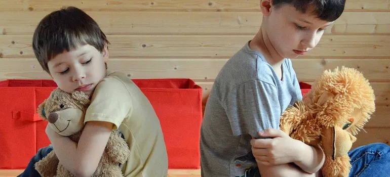two brothers as a part of tell your kids about the relocation guide