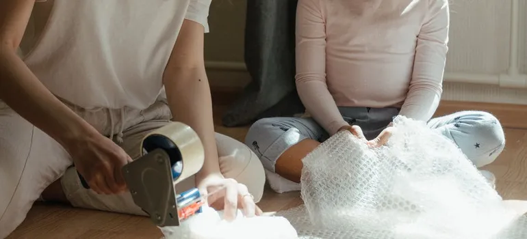 mother and daughter packing