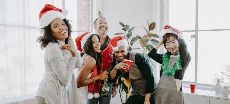 people in the office celebrating christmas