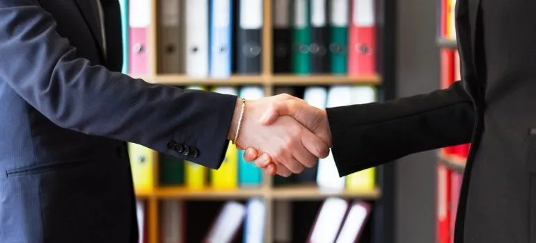 People shaking hands.