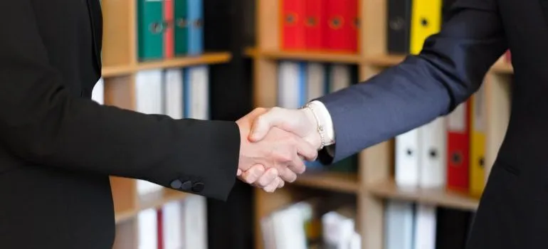 Two people shaking hands