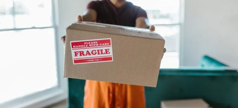 Mover holding a box