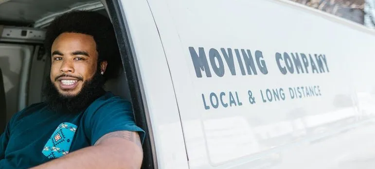 Two guys sitting in a van