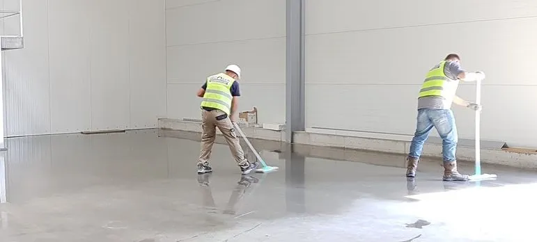 Three people cleaning