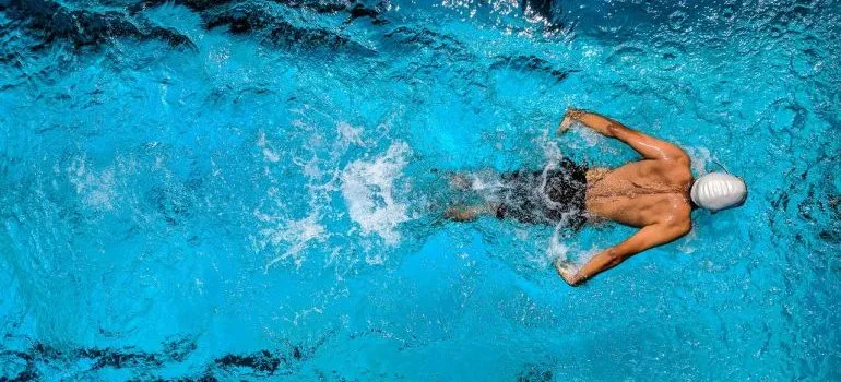 Person swimming in one of the NYC Pool