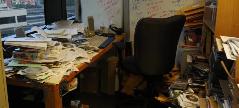a messy desk - ways to organize your paperwork