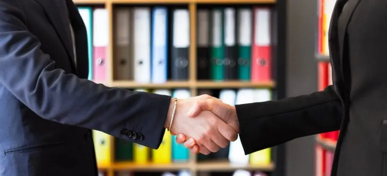 Two people shaking hands