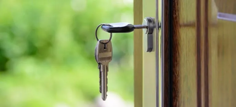 a key in the lock of a door