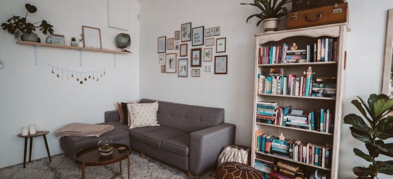 A tiny apartment with simple, but multifunctional elements, and even some art and decorative elements, possible to achieve when downsizing to a smaller apartment in NYC.