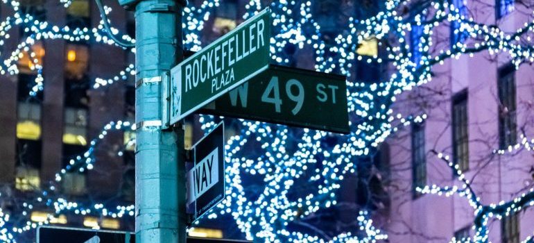 Street sign for Rockfeller Plaza