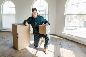 A mover with two cardboard boxes