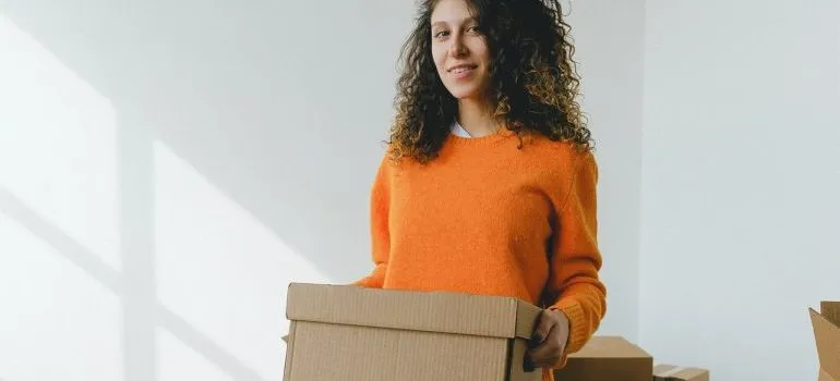 Woman packing and leaving Bergen County
