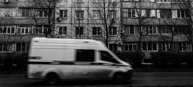 A van driving down a street